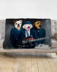 Personalized AC/Doggos 3 pet blanket with renaissance-style dog portraits on a gray couch.