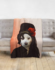 Custom pet portrait blanket featuring a white dog in a black beehive wig with red roses, Amy Doghouse style.