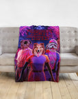 Custom personalized blanket with three pet portraits in a "Chewing Things" design, draped over a sofa.