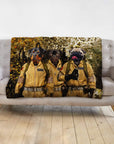 Personalized pet portrait blanket featuring three dogs dressed as Ghostbusters on a gray sofa.