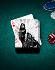 Personalized playing cards featuring two dogs in Kiss-style rockstar costumes on a green felt table.