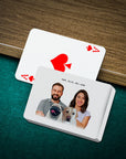 Personalized playing cards featuring a custom portrait of two humans, a pug, and a golden retriever.