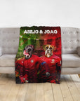Personalized Portugal Doggos blanket with two dogs in soccer jerseys, named Abilio & Joao, on a sofa.