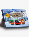 Personalized 'South Bark' standing canvas featuring three pets in winter clothes against a snowy mountain backdrop.