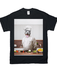 Black Gildan unisex t-shirt featuring a personalized design of a smiling grey pit bull dog in a chef's hat and coat in a kitchen.