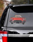 Custom pet decal featuring a dog driving a red classic car, applied to a black SUV rear window.