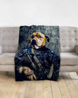 Personalized pet blanket featuring a dog in a navy veteran portrait, draped over a beige sofa.