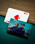 Personalized playing cards featuring two dogs in police officer uniforms on a green felt table.