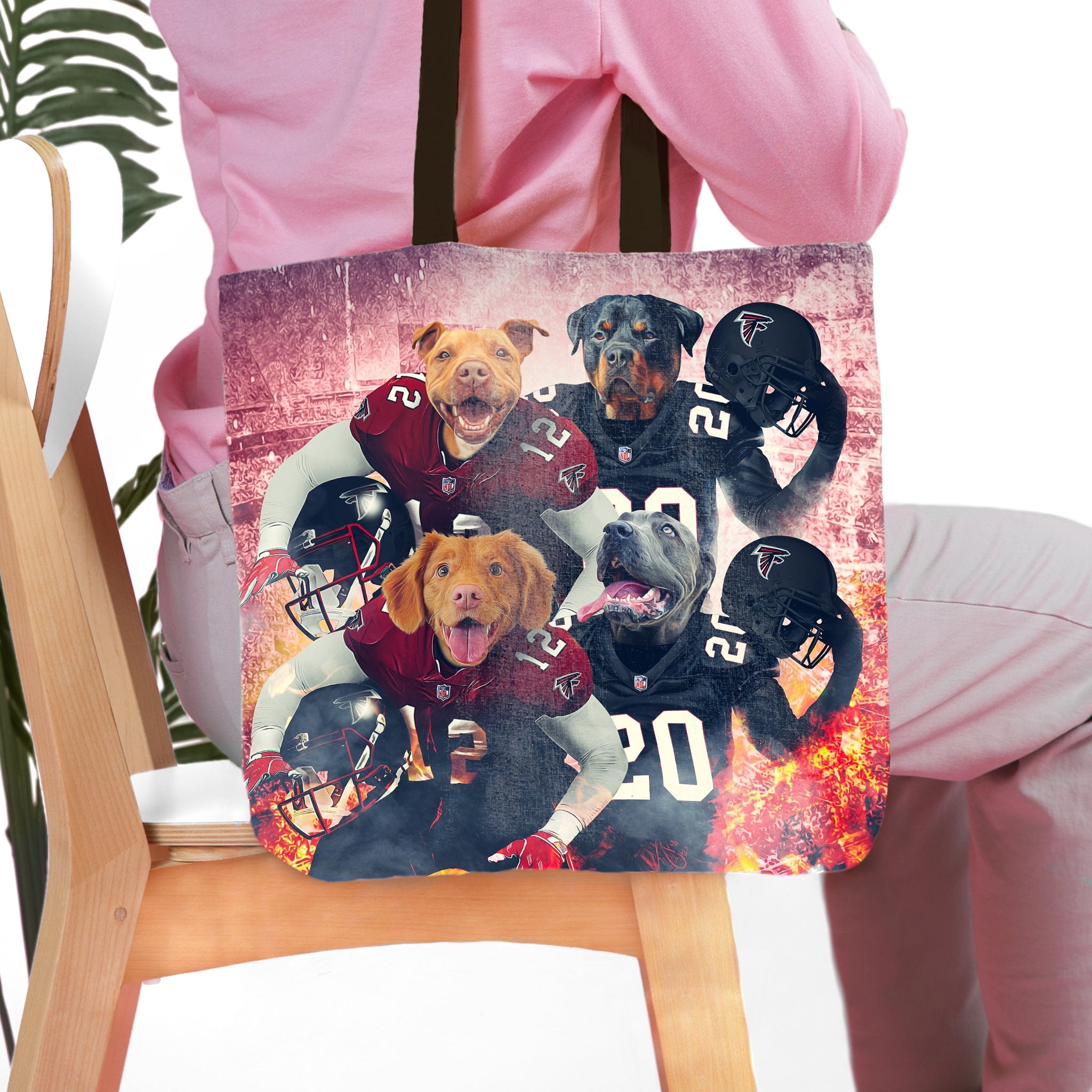 Personalized 4-pet tote bag featuring custom dog portraits in Atlanta Falcons football uniforms.