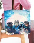 Personalized 3-pet tote bag with custom dog portraits in Carolina football jerseys.