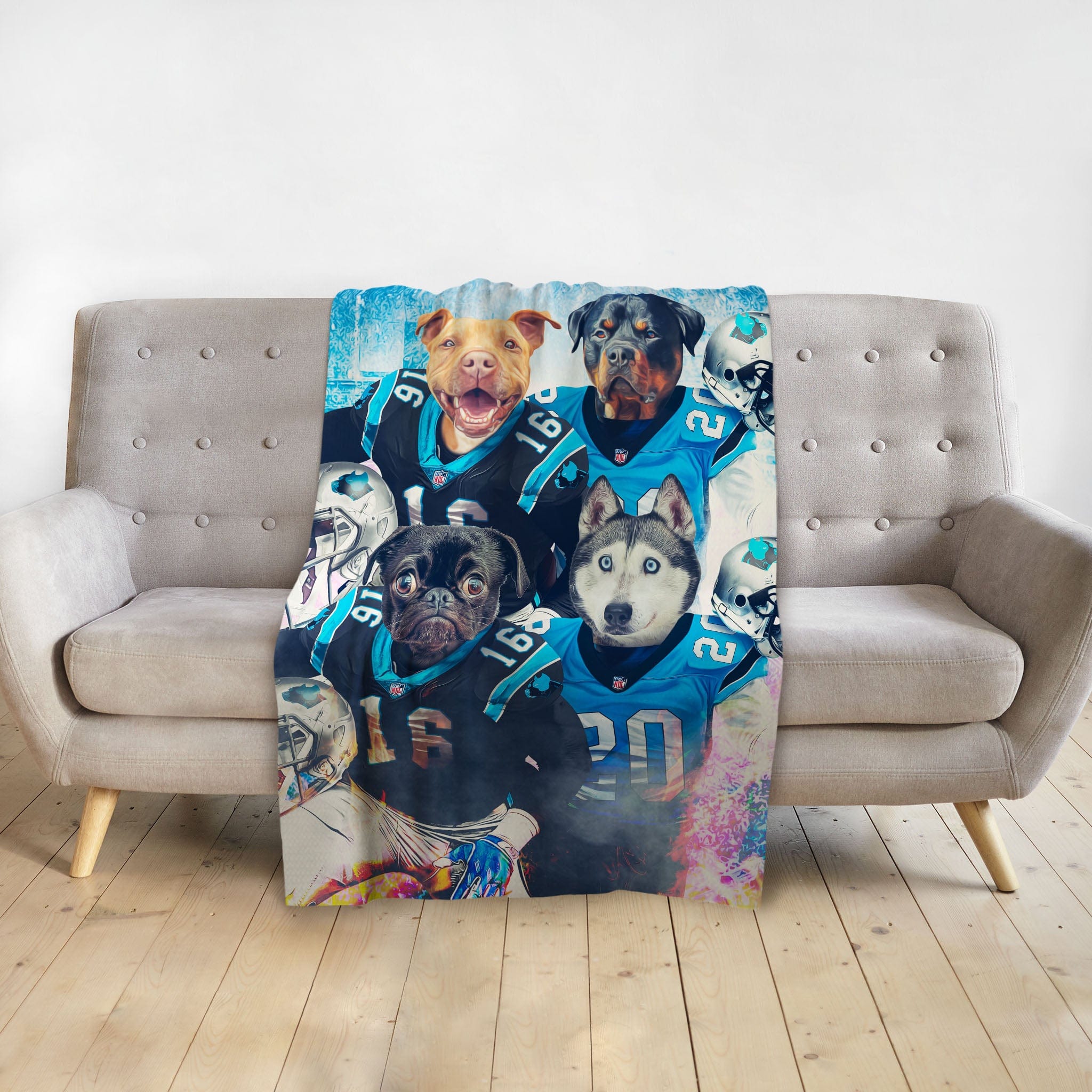 Personalized pet blanket with four dogs in Carolina Panthers football jerseys.