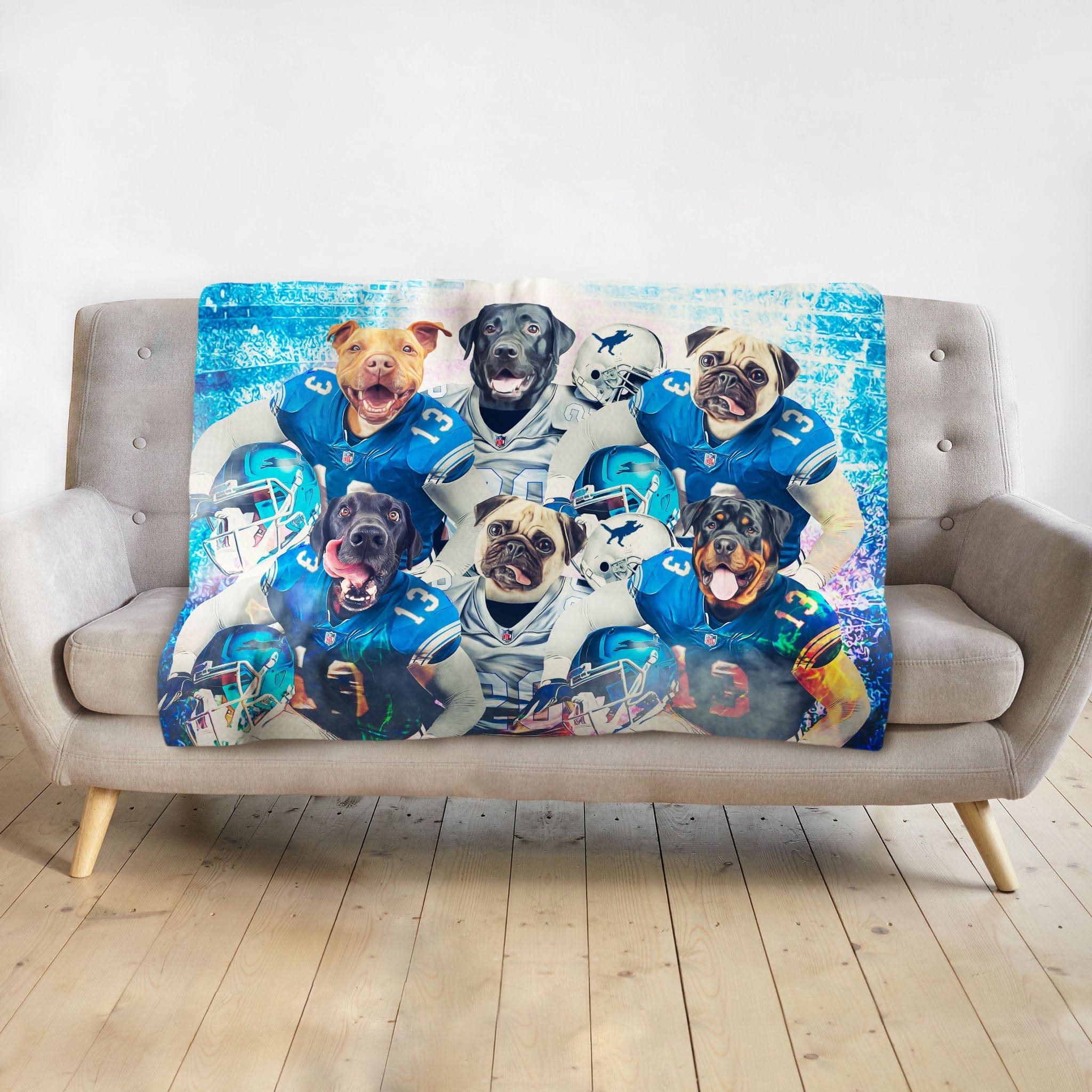 Personalized Detroit Doggos 6-pet blanket with dogs in blue football uniforms on a gray couch.