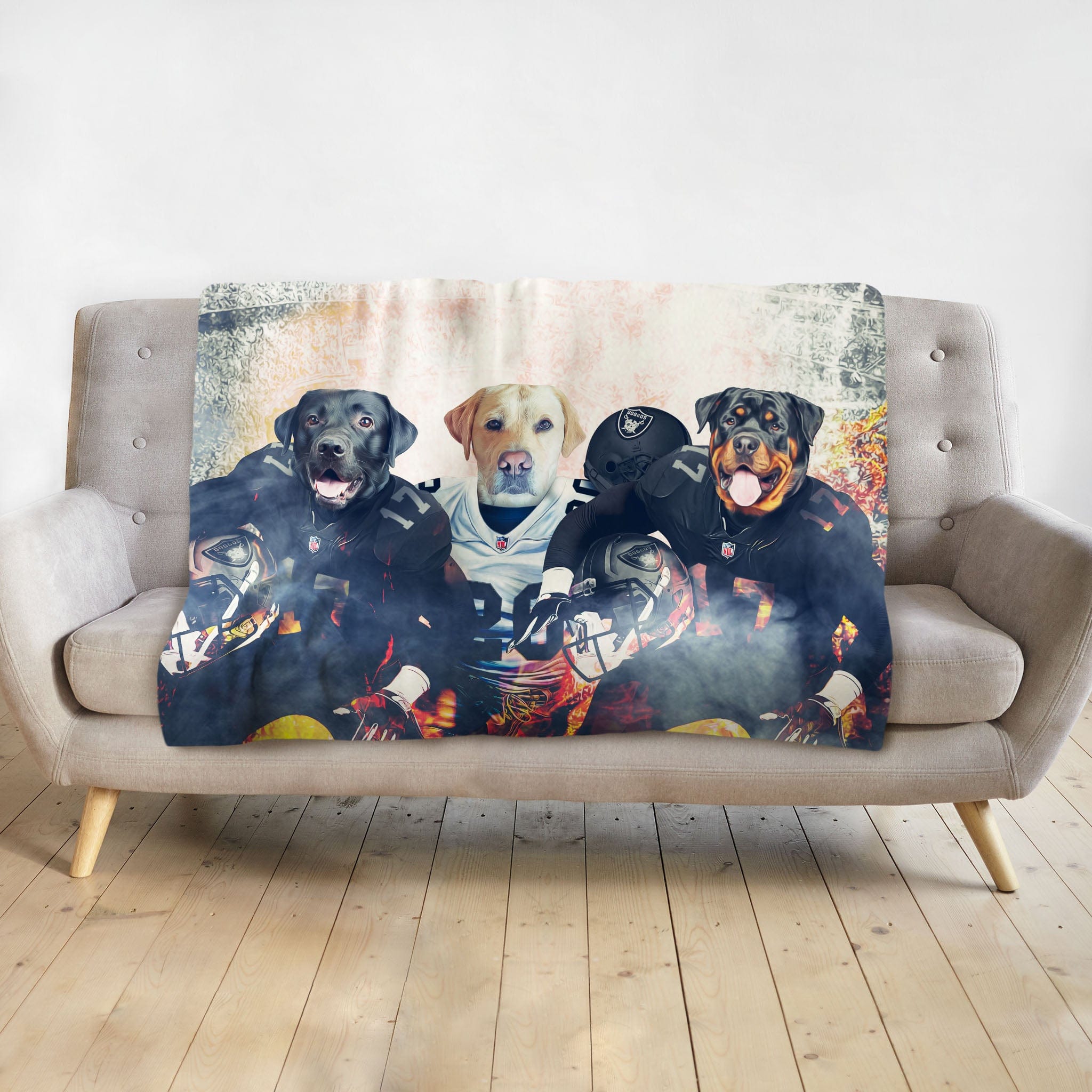 Personalized pet blanket with three dogs as football players in black and white uniforms.