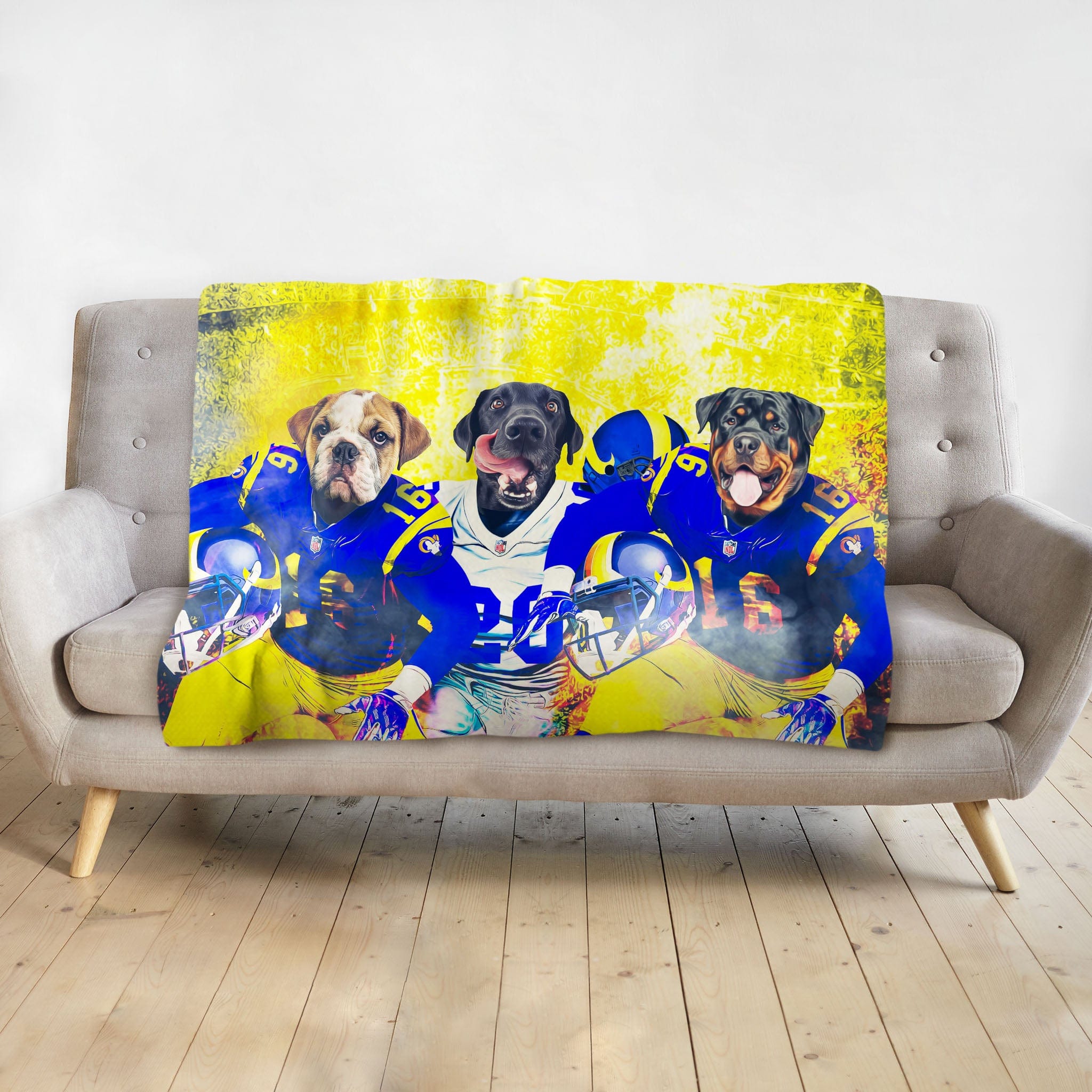 Personalized 3-pet blanket with dogs in blue and yellow football uniforms.