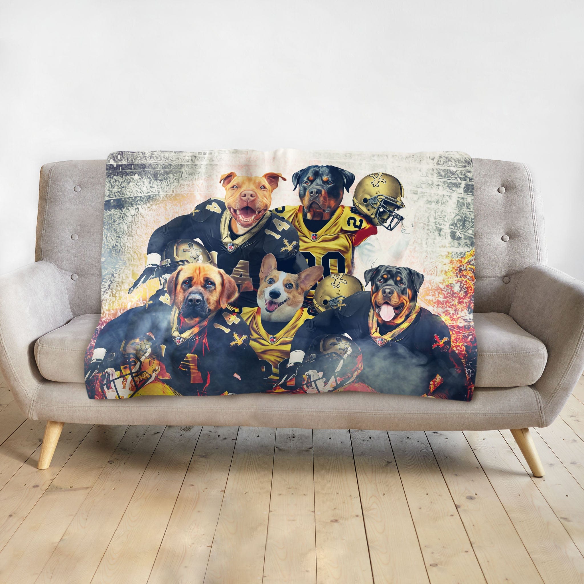 Personalized minky blanket with five dogs in New Orleans Saints football uniforms.
