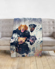 Personalized pet blanket with four dogs in football uniforms on a grey sofa.