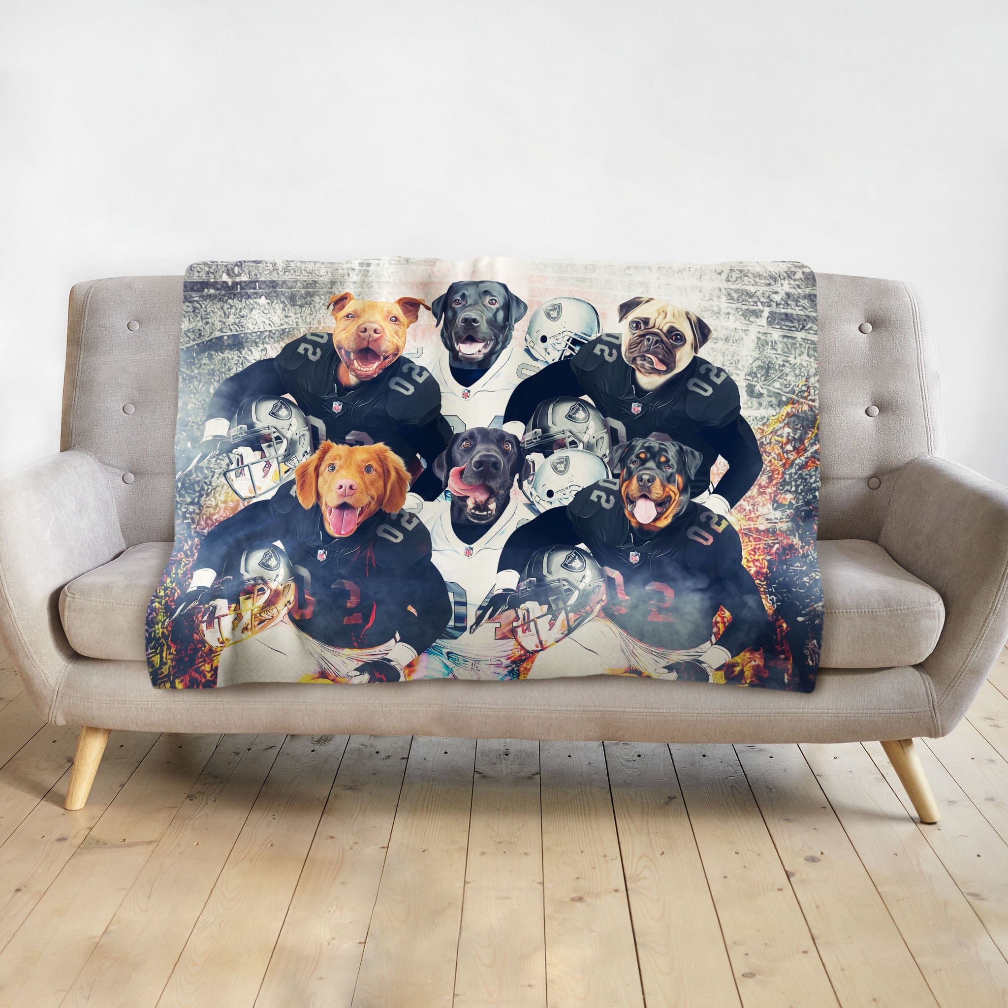 Personalized minky blanket with 6 custom dog portraits in football uniforms on a gray sofa.