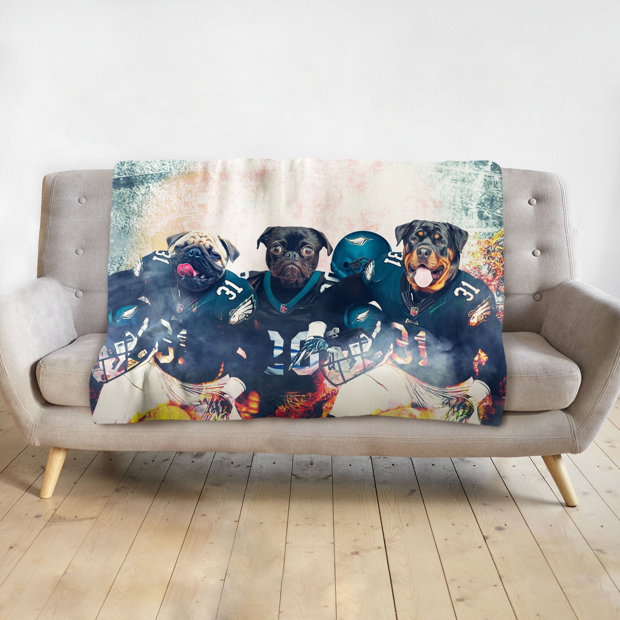 Personalized pet blanket with three dogs in Philadelphia Eagles football uniforms.