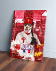 Personalized pet canvas featuring a dog in a red Phillies baseball uniform with "ROCKY" on the jersey, against a red cityscape.