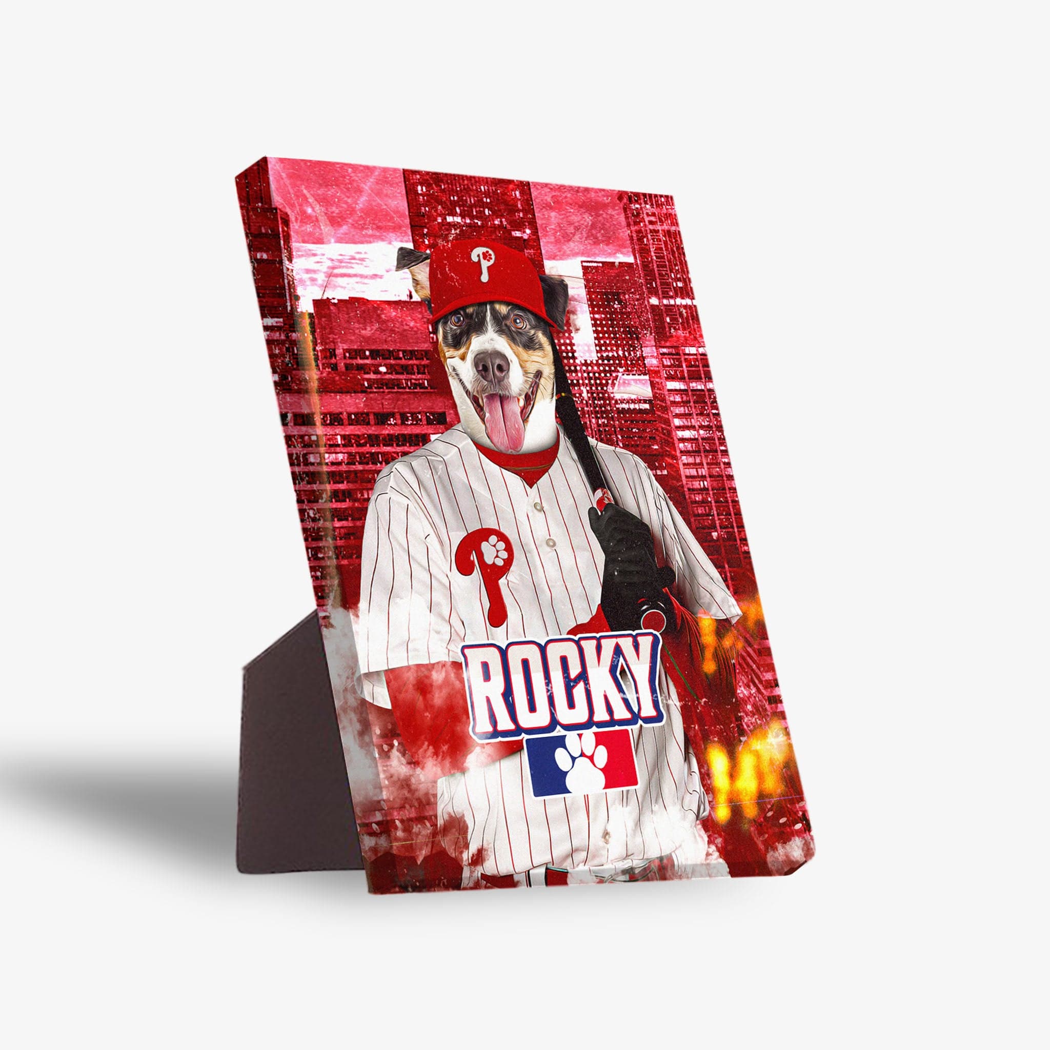 Personalized pet standing canvas featuring a dog in a red Phillies baseball uniform, hat, and holding a bat, against a red cityscape background.