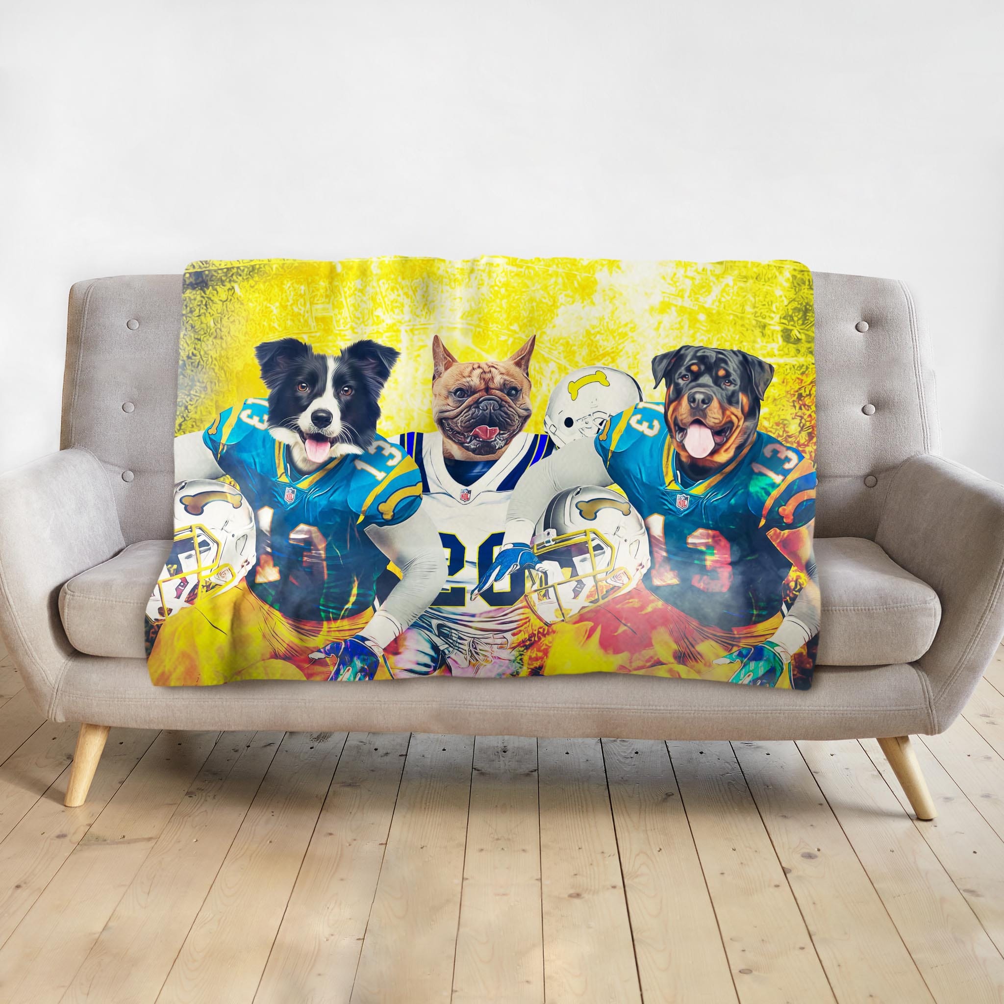 Personalized pet blanket with three dogs in football uniforms against a yellow background.