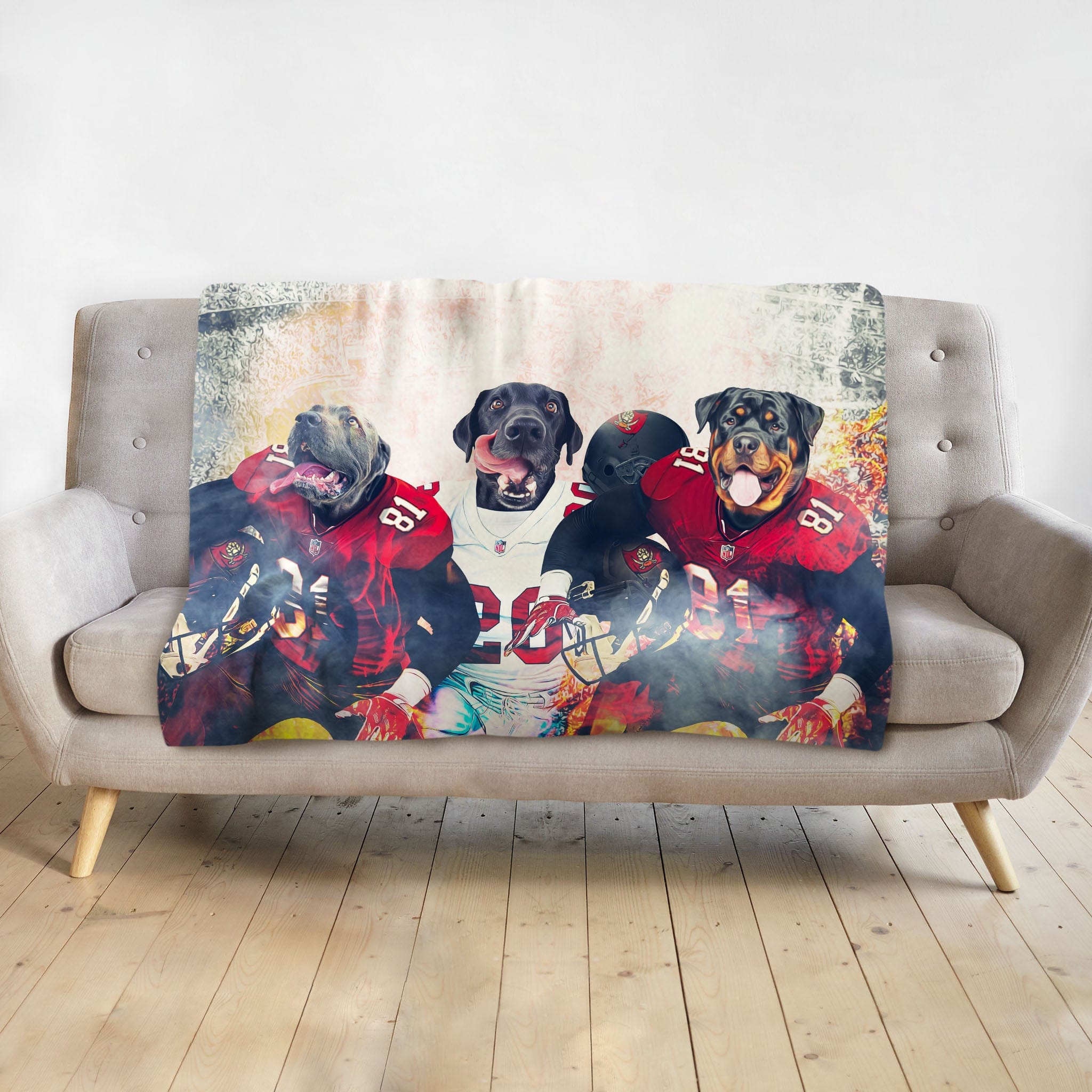 Personalized 3-pet blanket with dogs in Tampa Bay Doggos football uniforms.