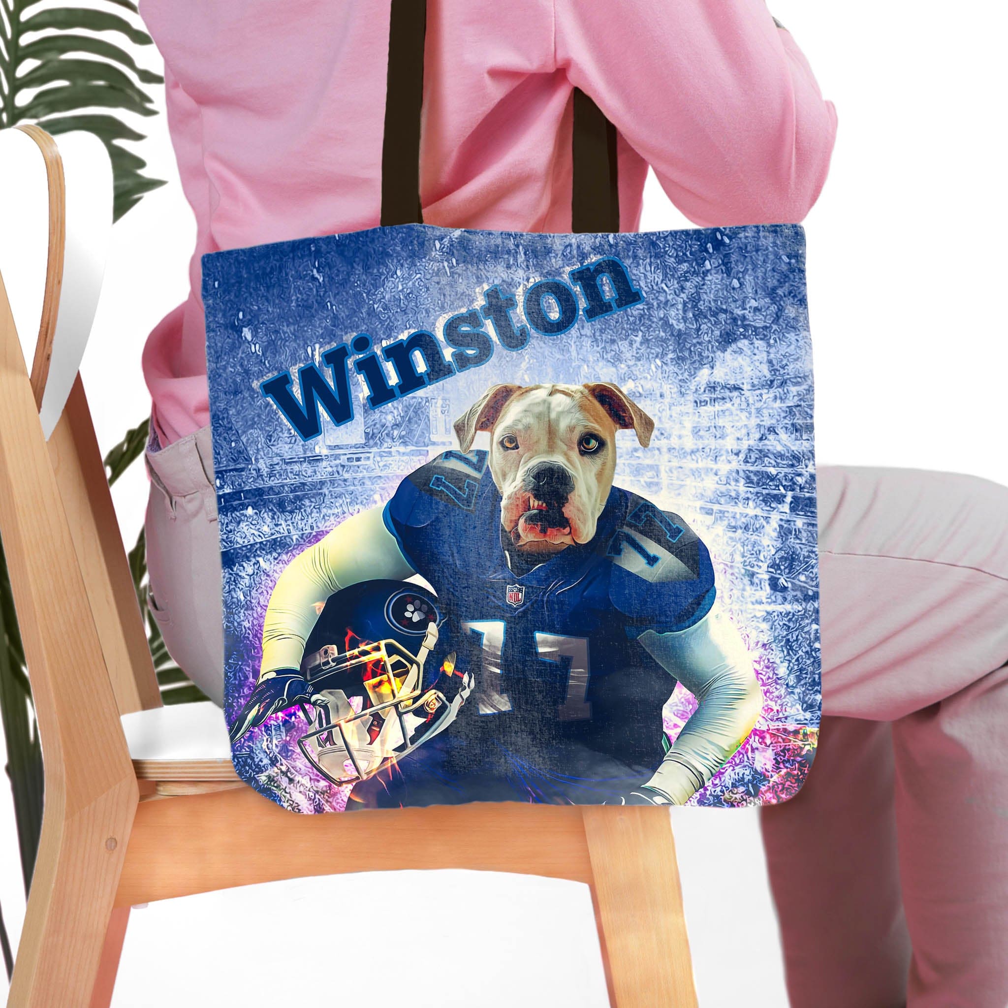 Personalized blue tote bag with a custom pet portrait of a bulldog in a football uniform, named Winston.