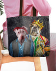 Personalized black tote bag with two pet portraits: a pit bull in a bandana and a bulldog in a crown.