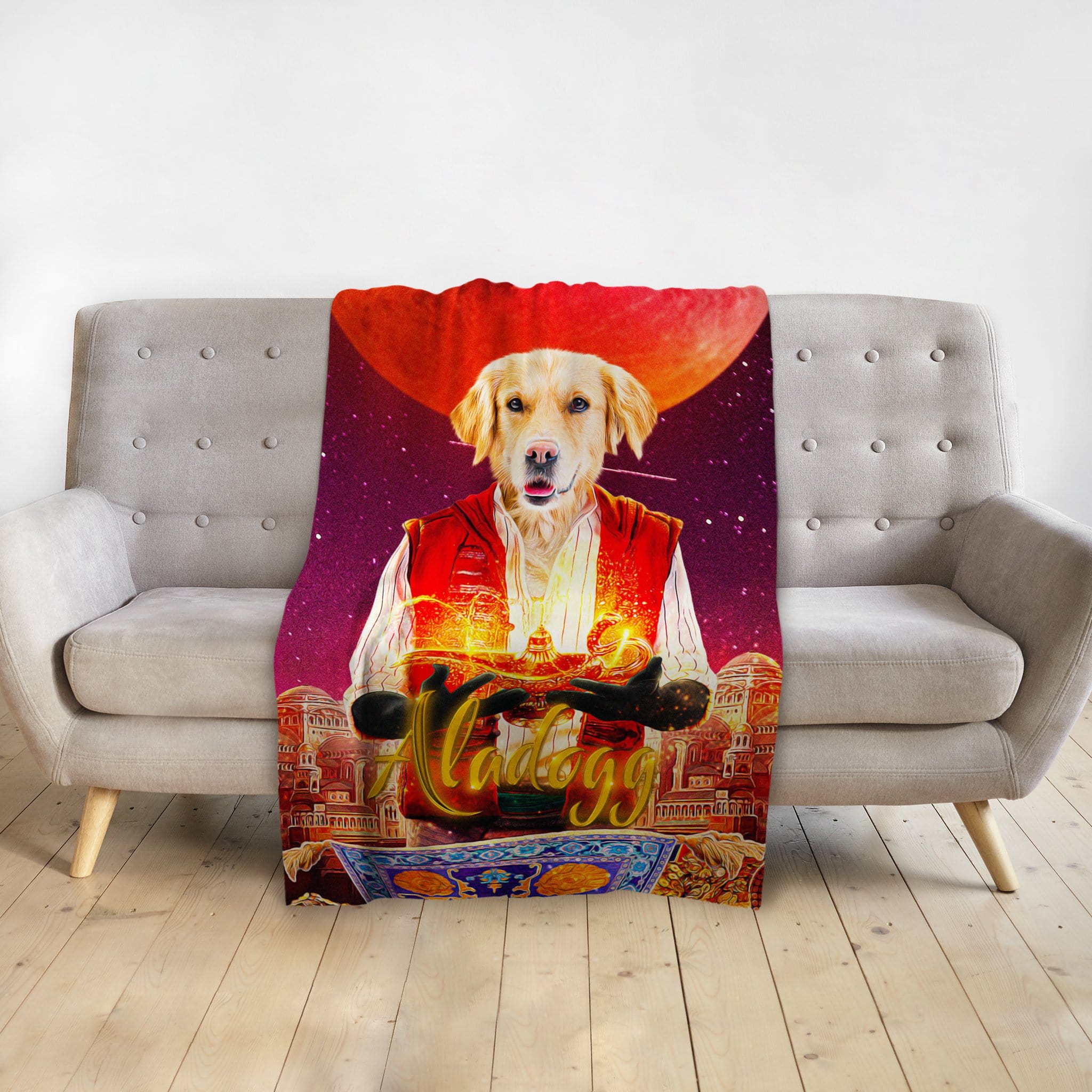 Personalized pet blanket with a Golden Retriever in an "Aladdin" style portrait, draped over a gray sofa.