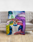 Personalized pet blanket with a corgi in an Alice in Wonderland-style portrait, draped over a gray couch.