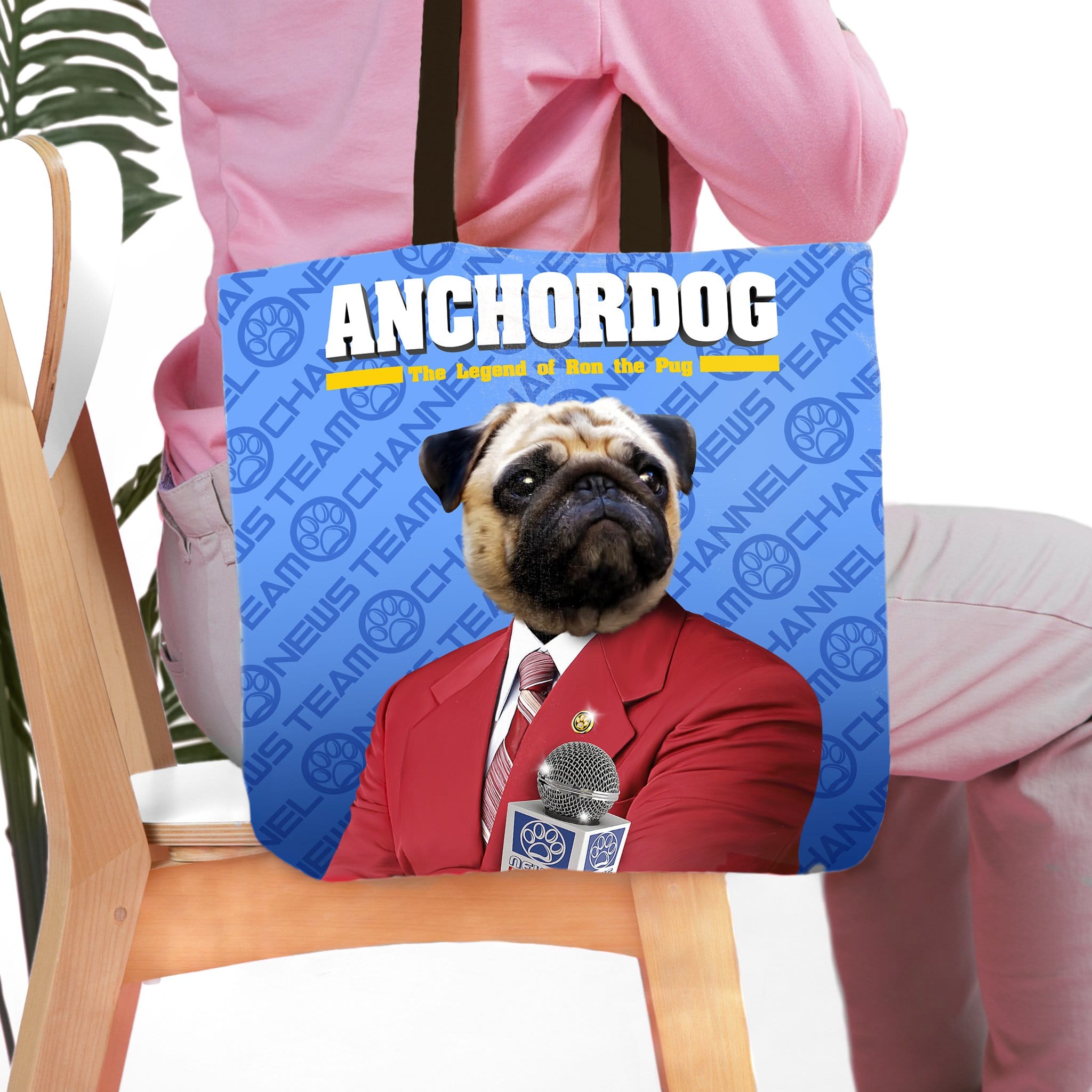 Personalized Anchordog tote bag with a pug pet portrait in a red suit, holding a microphone.