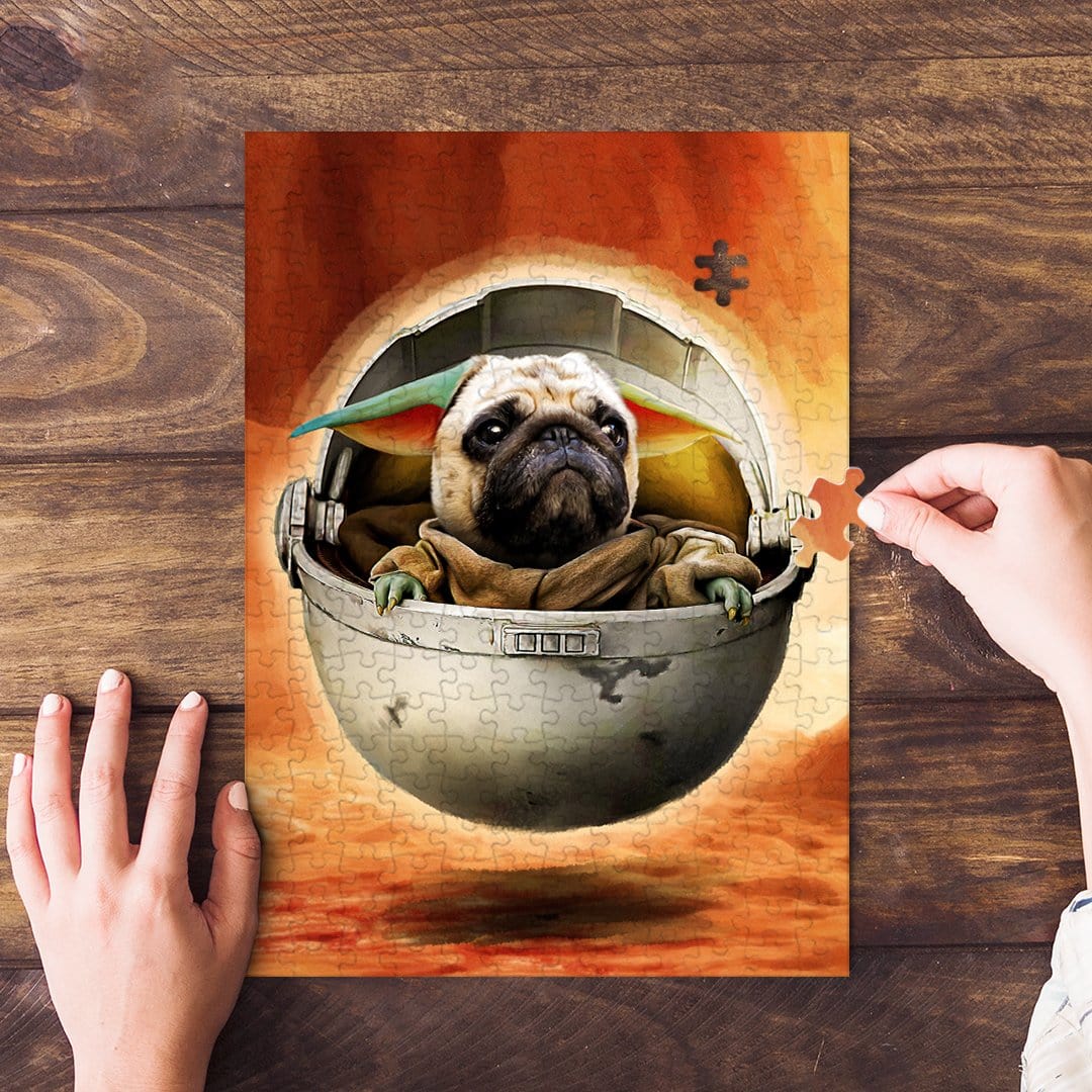 Personalized 'Baby Yodogg' puzzle featuring a pug in a pod, with hands assembling pieces.