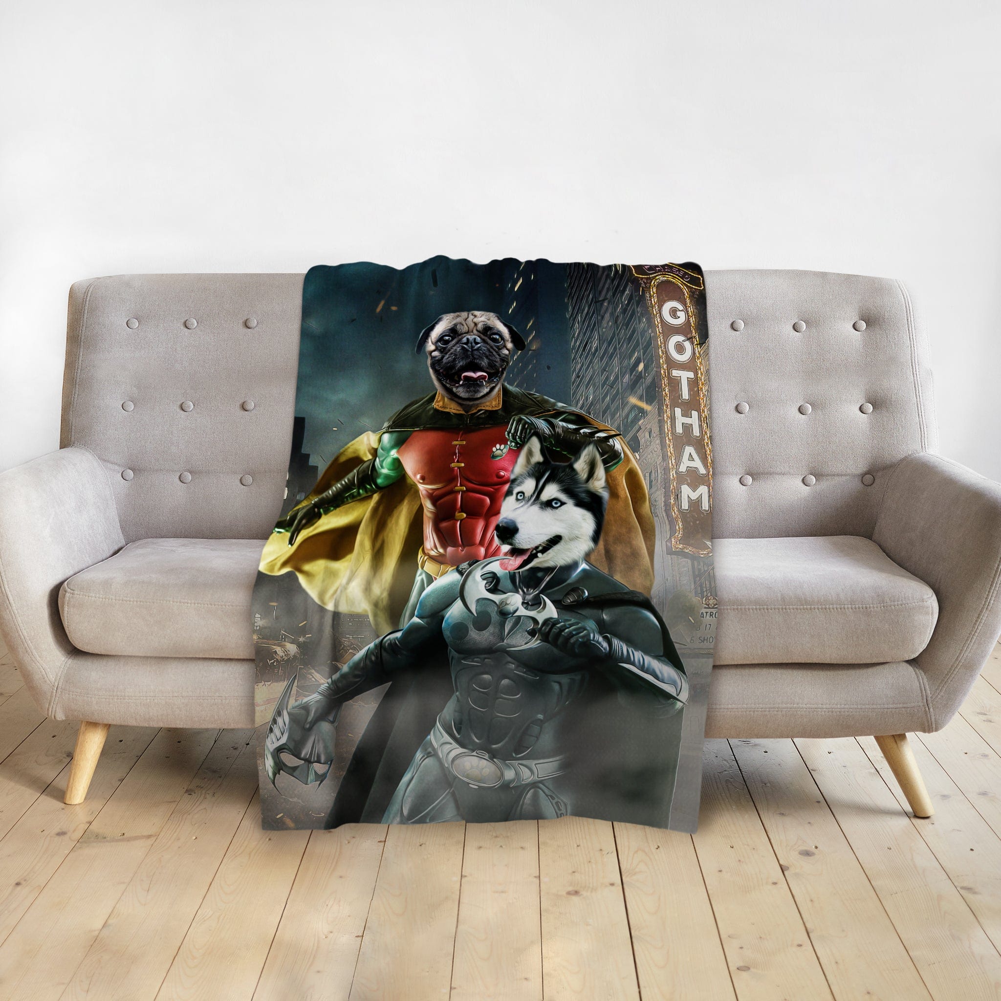 Personalized pet blanket with a pug as Robin and a husky as Batman in a Gotham city scene.