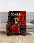 Personalized pet blanket with a dog in a Belgium soccer uniform, named "JONAS," on a red and black background.