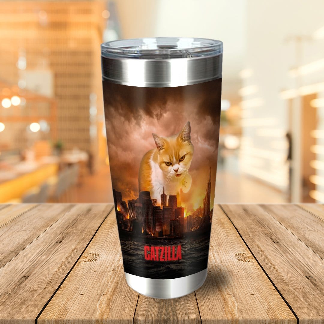 Personalized stainless steel tumbler with a "Catzilla" cat portrait over a city skyline at sunset.