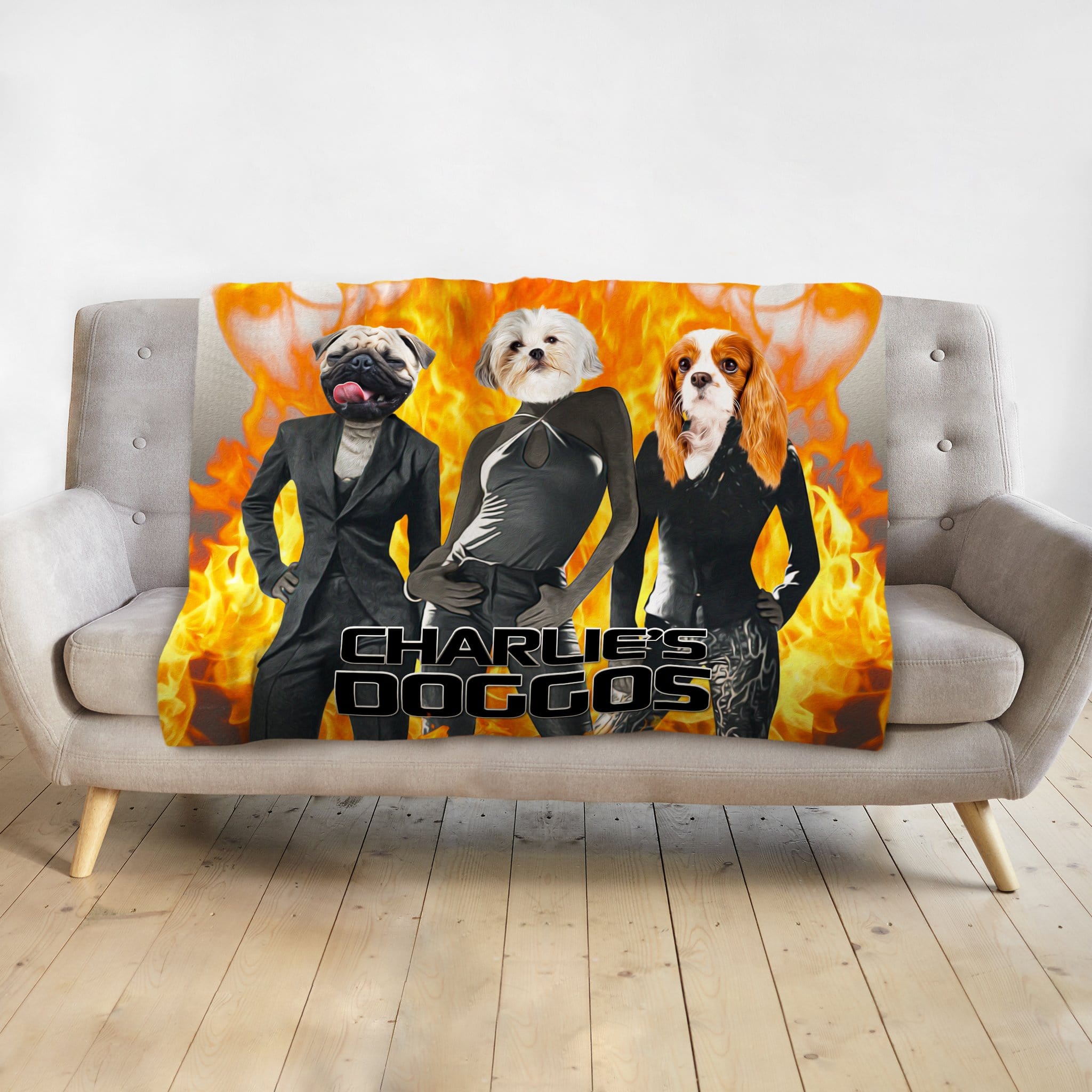 Personalized 3-pet blanket with Doggovinci portraits of a pug, Maltese, and Cavalier King Charles Spaniel on a fiery background.
