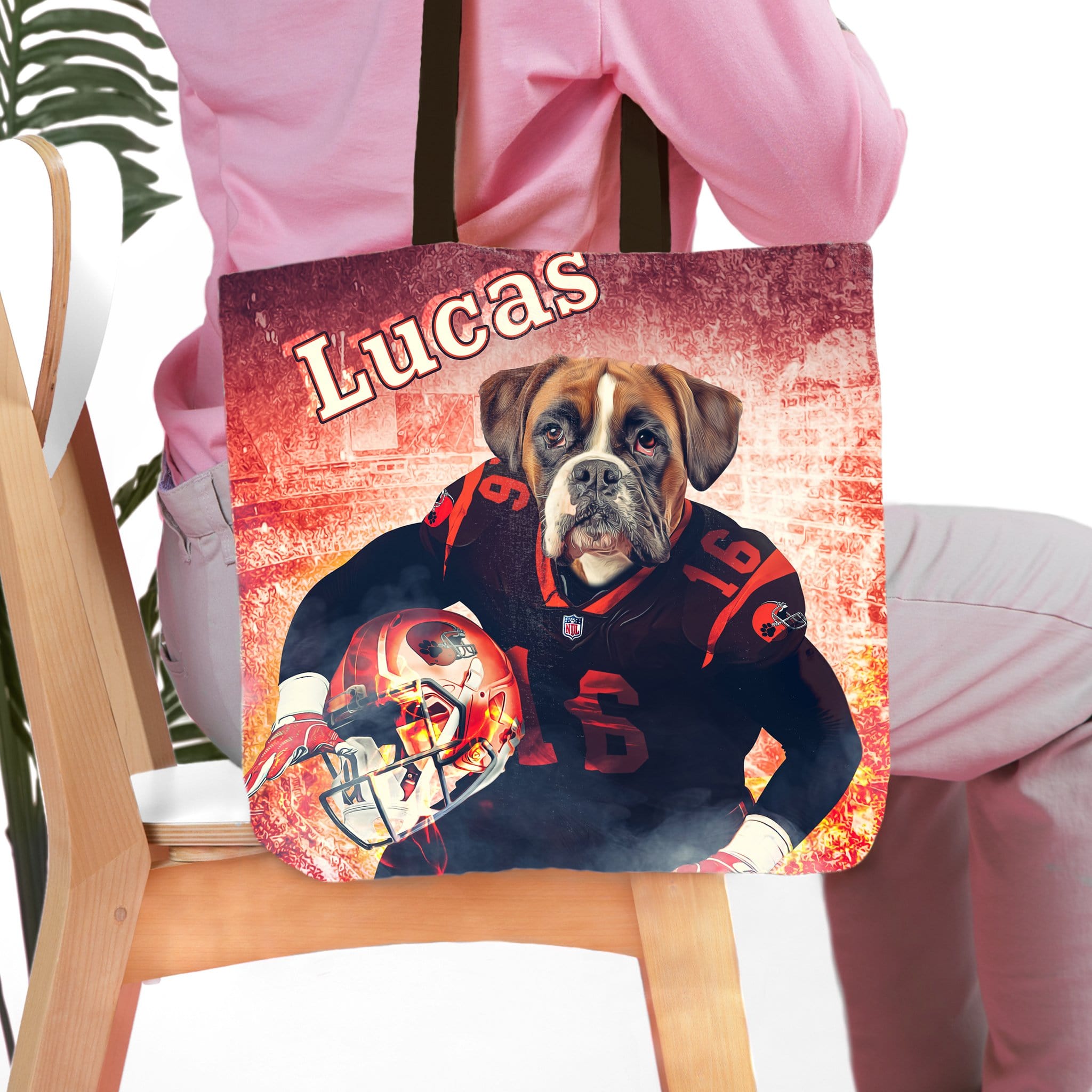 Personalized 'Cleveland Doggos' tote bag featuring a boxer dog in a football uniform with "Lucas" text.