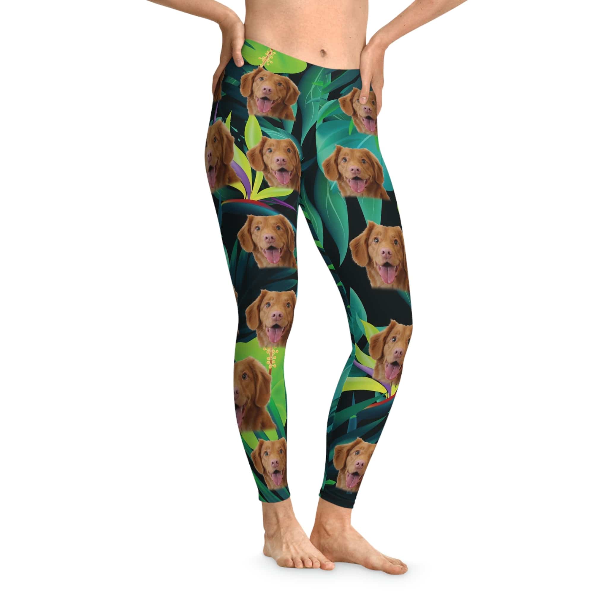 Verdant green custom leggings with multiple brown dog faces and tropical leaves, mid-waist, ankle-length.