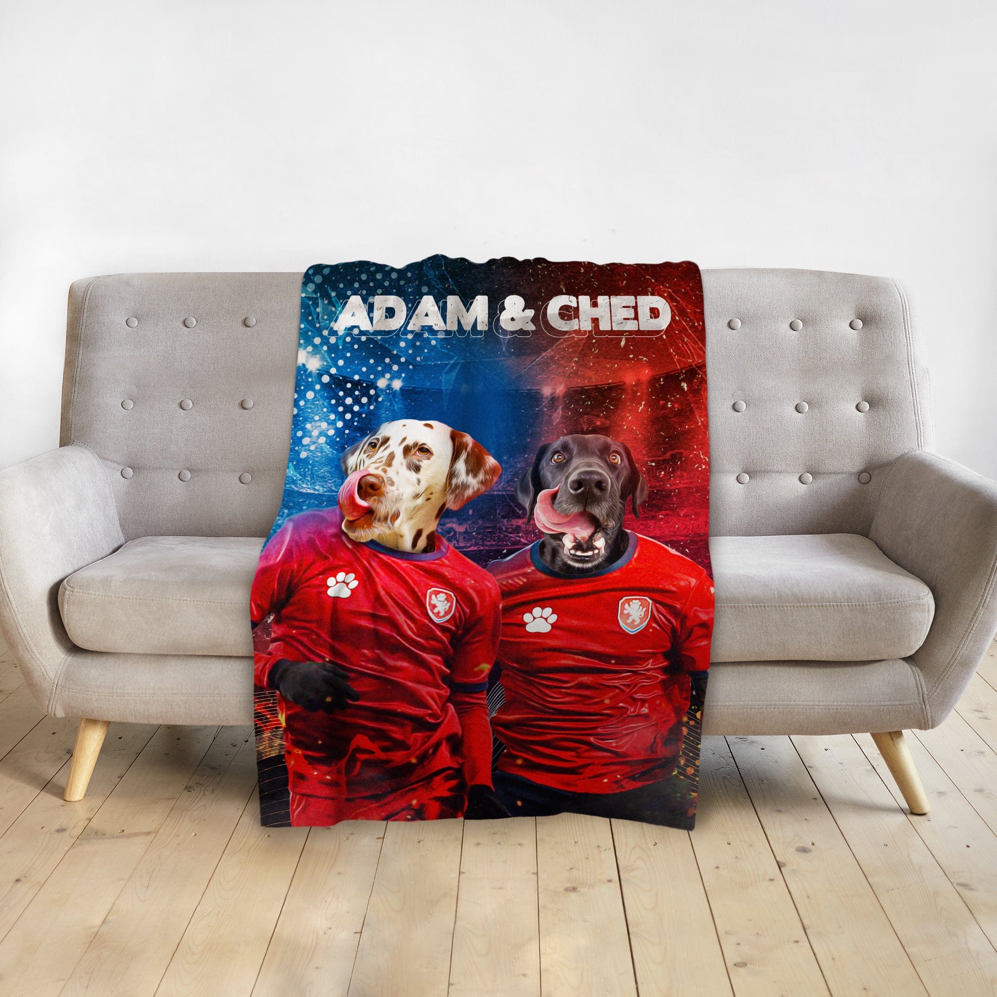 Personalized pet blanket with two dogs in red soccer jerseys, a Dalmatian and a black Labrador, on a red and blue background.