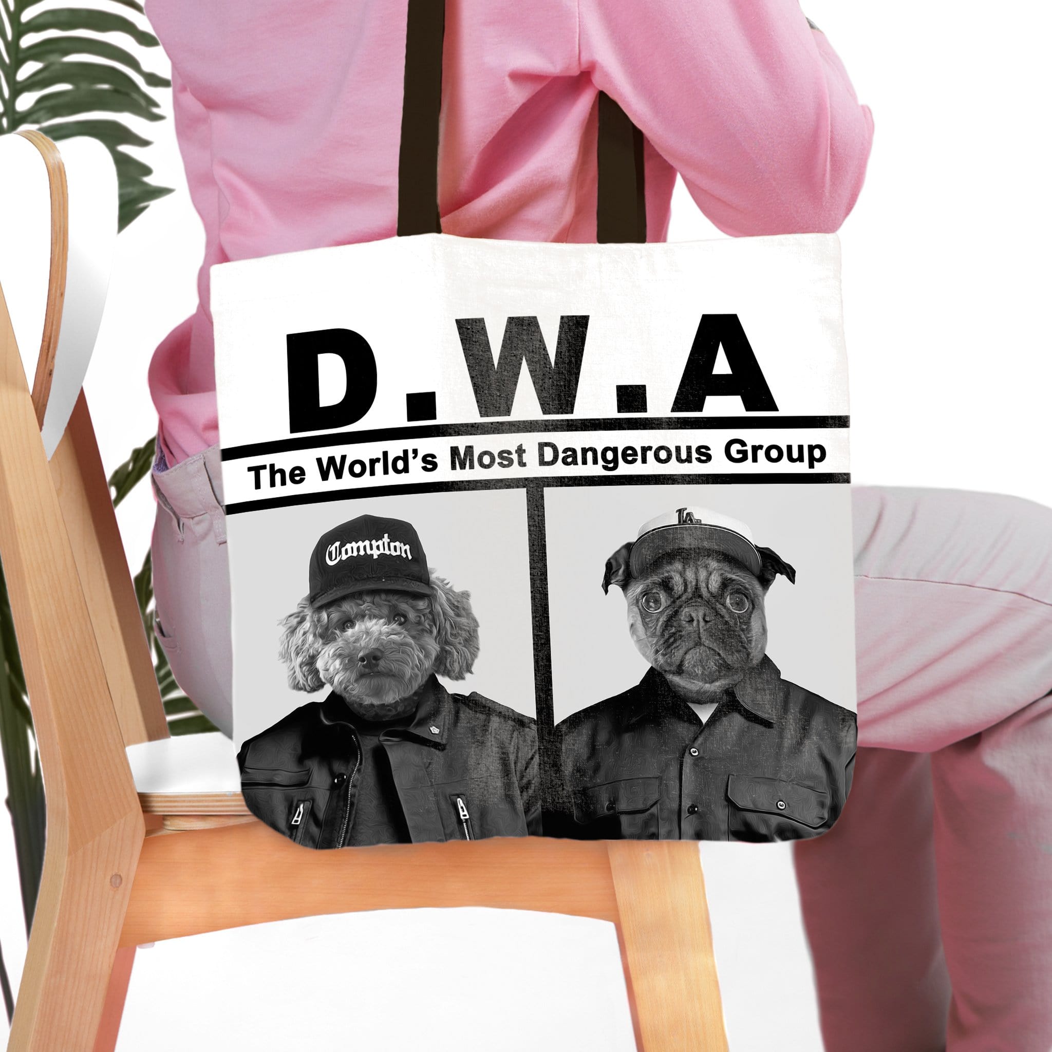 Personalized D.W.A. 2-pet tote bag with custom dog portraits in black and white.