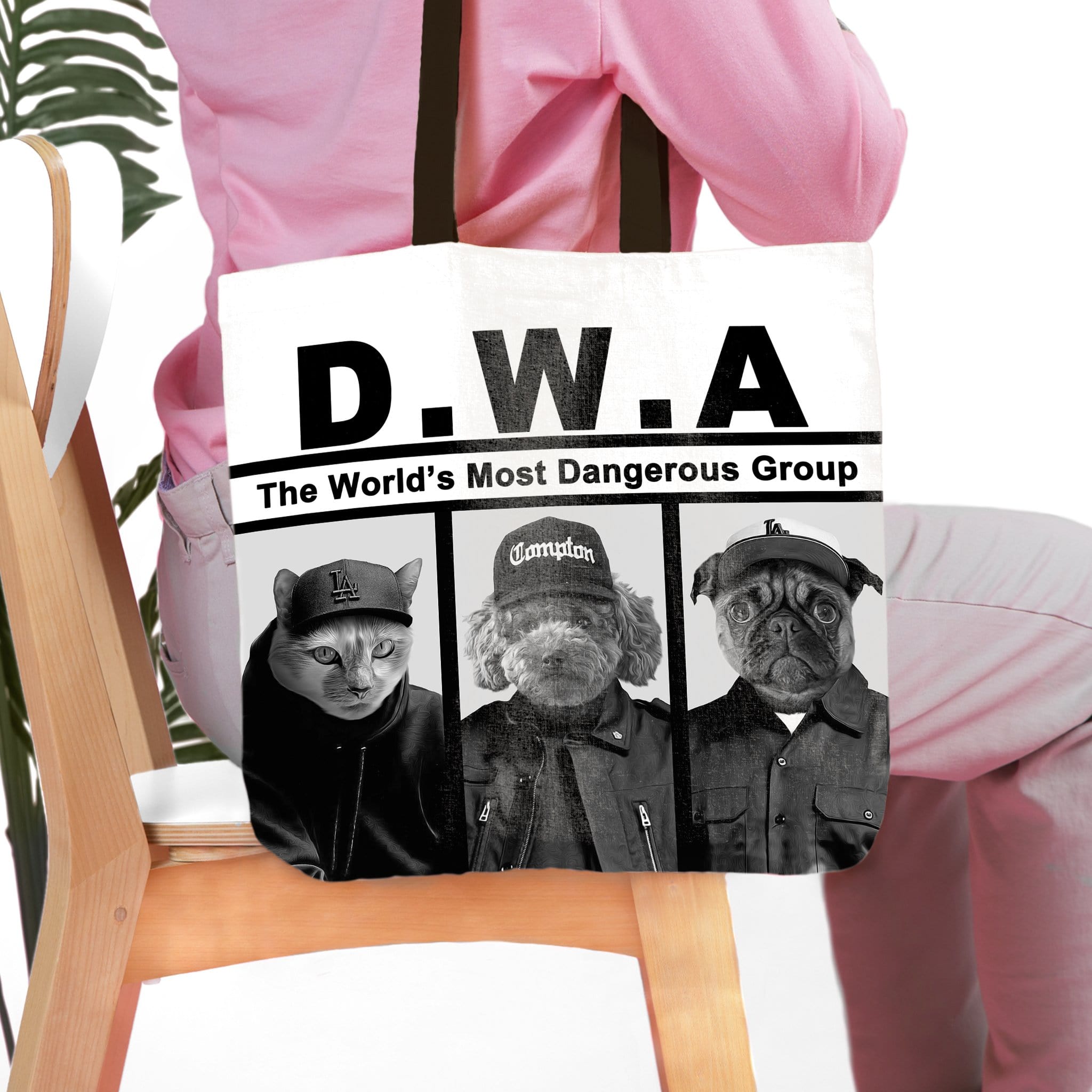Personalized D.W.A. 3 pet tote bag featuring custom dog and cat portraits in black and white.