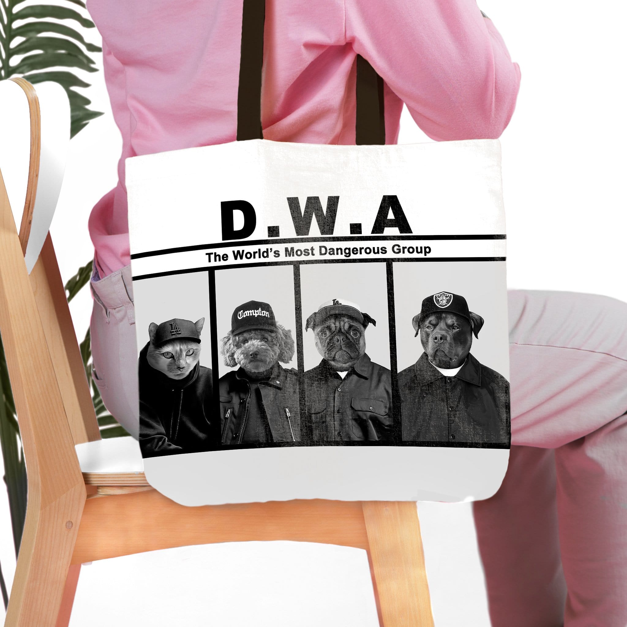 Personalized D.W.A. 4-pet tote bag featuring custom dog and cat portraits in a mugshot style.