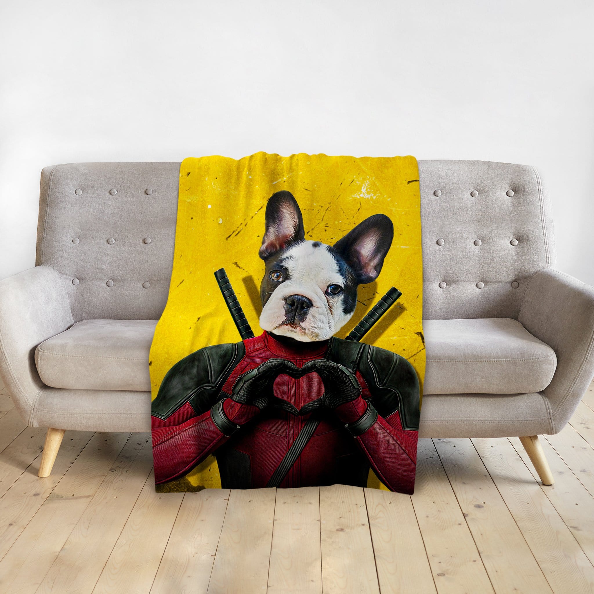 Personalized pet blanket with a French Bulldog in a Deadpool costume making a heart shape, on a yellow background.
