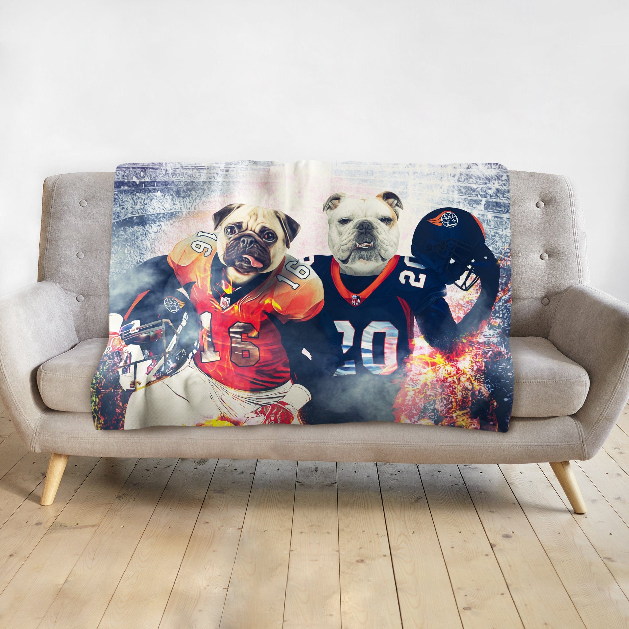 Personalized minky blanket with two custom dog portraits in football uniforms.