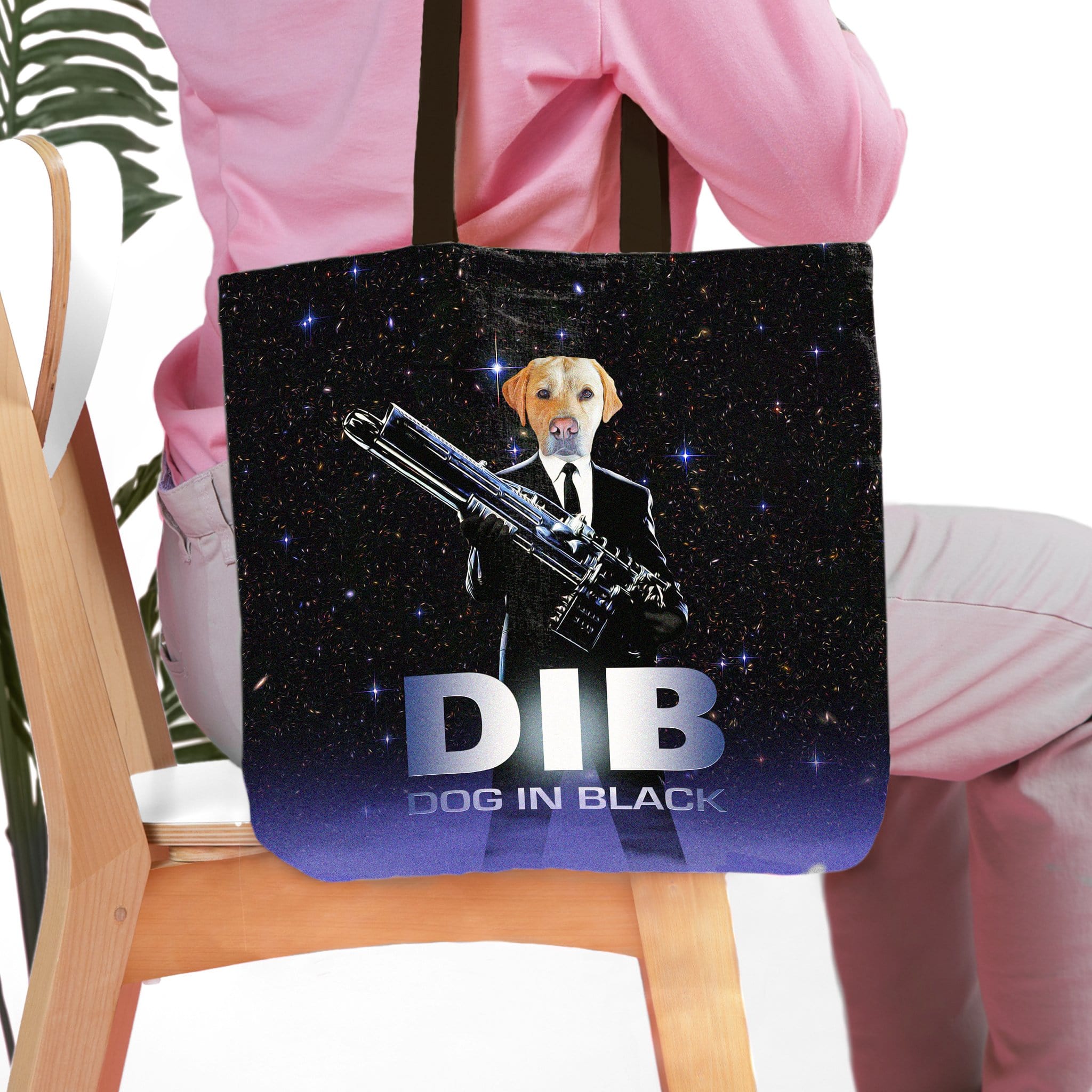 Personalized black tote bag with a custom dog portrait in a suit holding a weapon, "DIB Dog in Black" text.