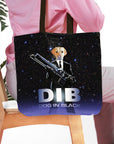 Personalized black tote bag with a custom dog portrait in a suit holding a weapon, "DIB Dog in Black" text.