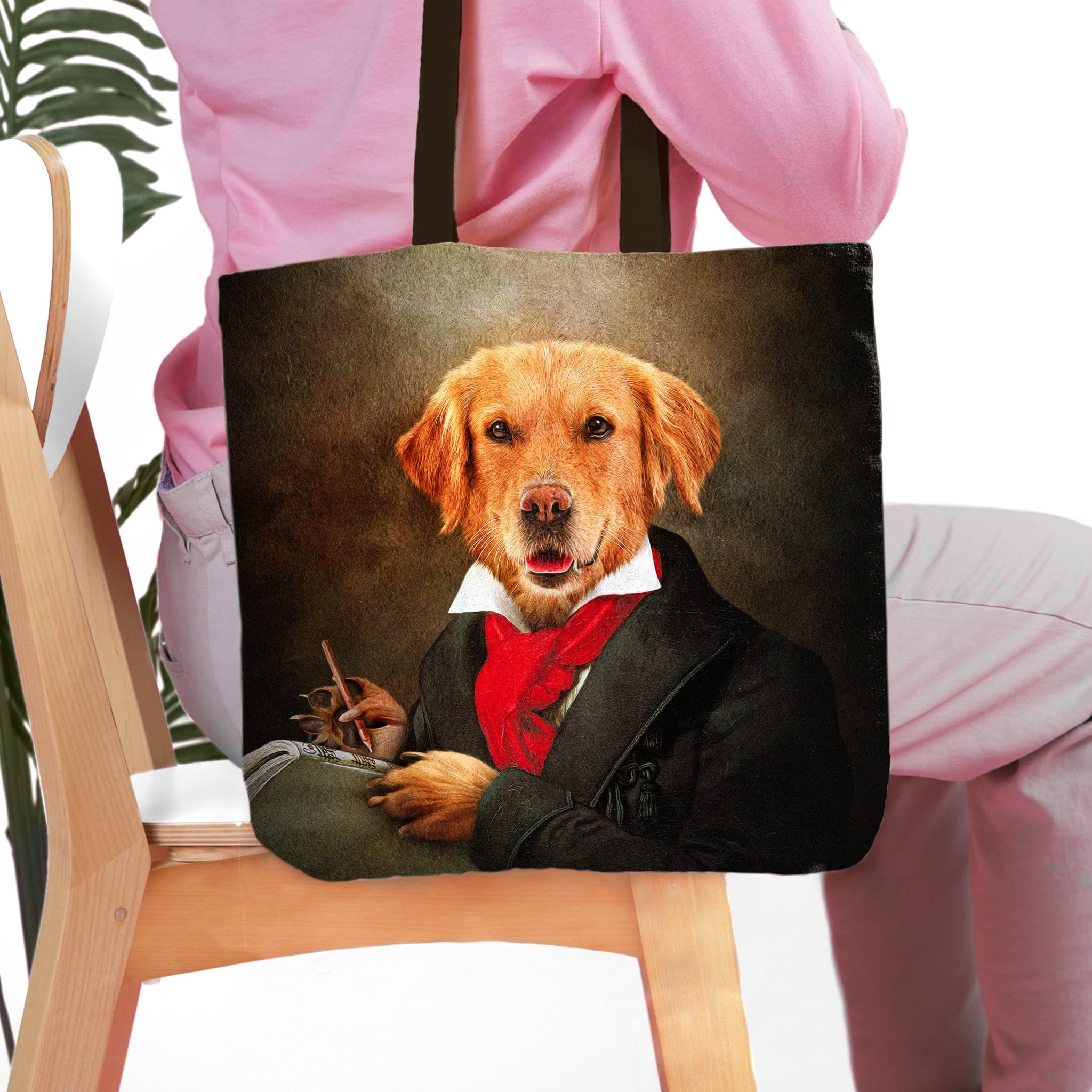 Personalized black tote bag with a custom renaissance portrait of a golden retriever in a suit.