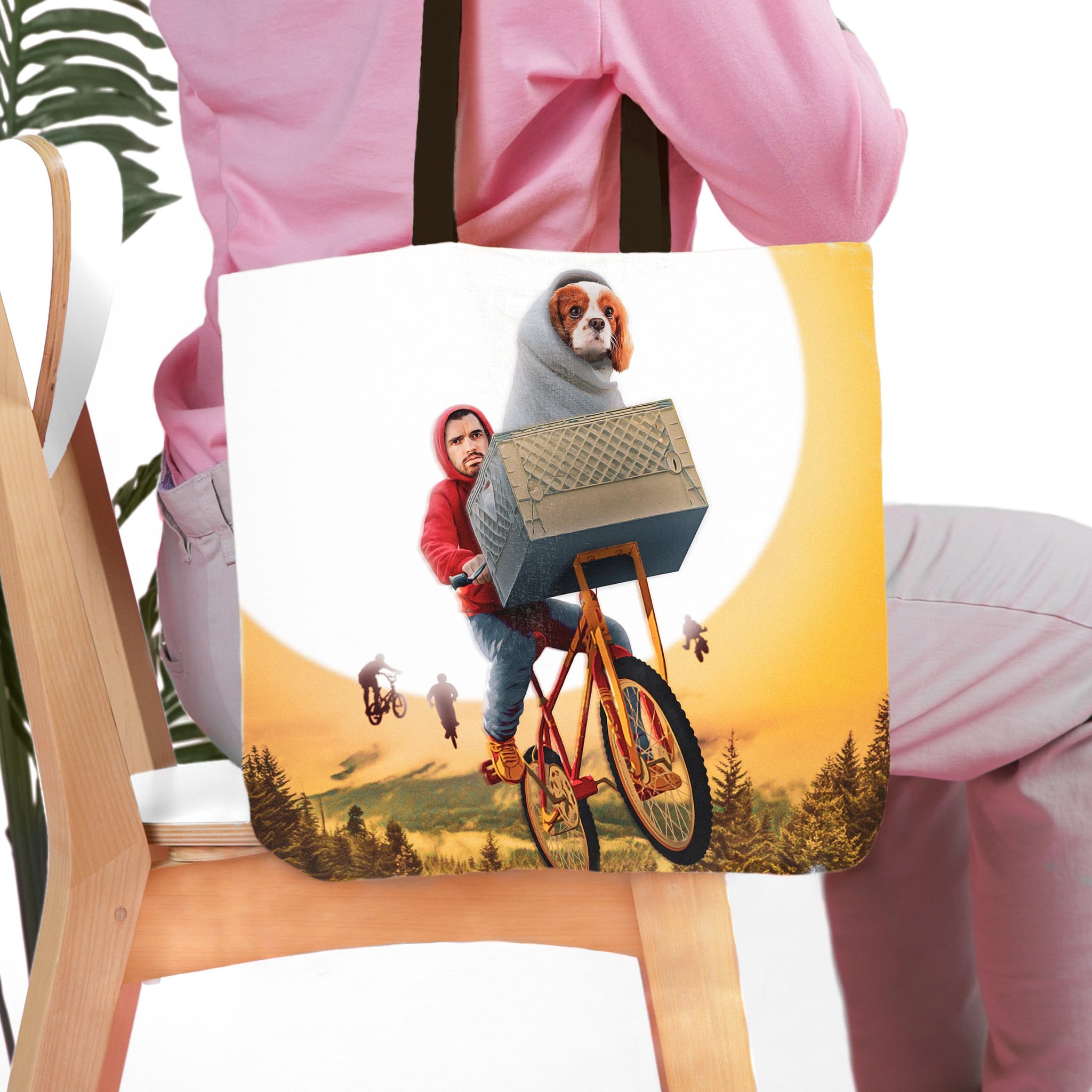 Personalized "Doggo-Terrestrial" pet and human portrait tote bag with a dog in a basket on a bicycle.