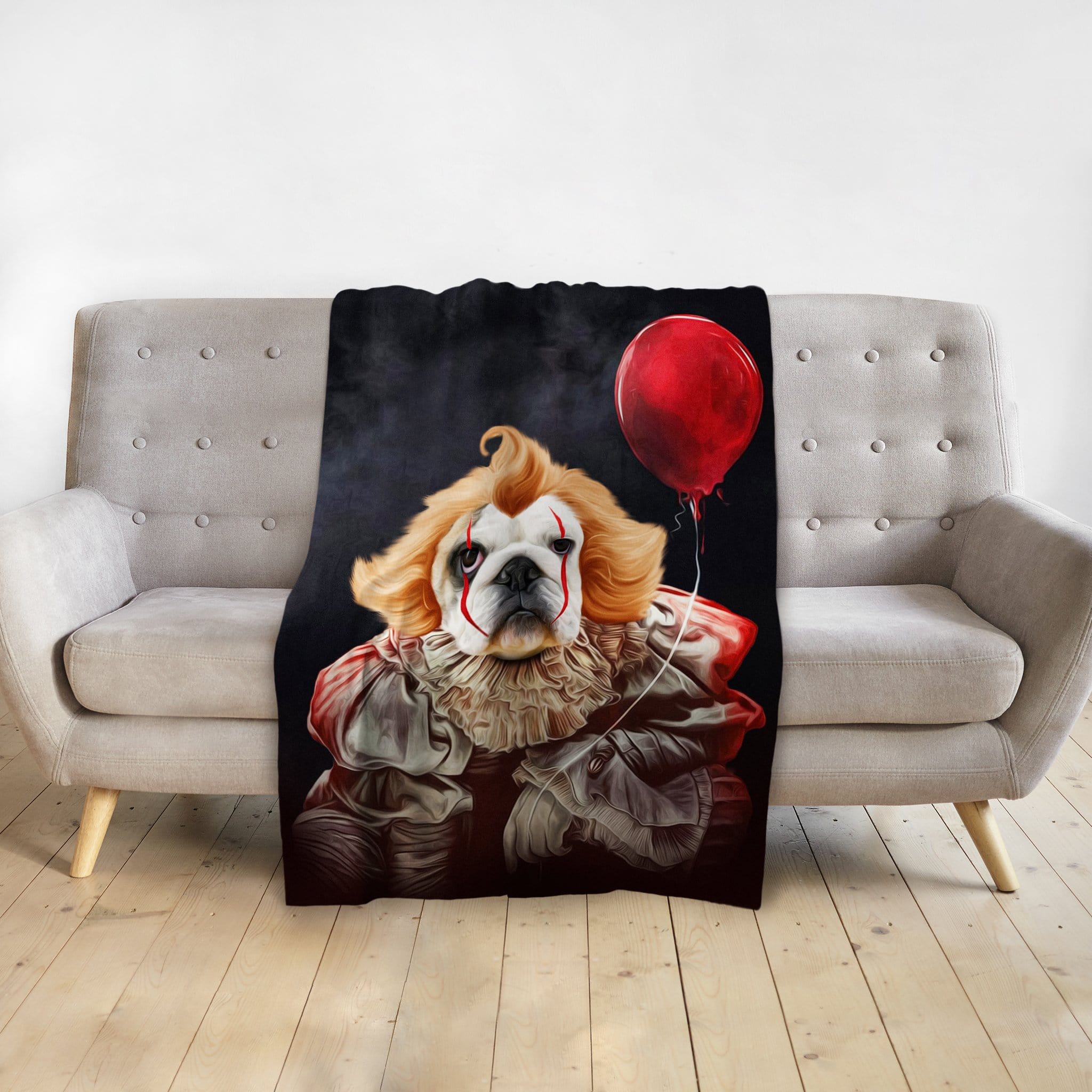 Personalized pet blanket with a Doggovinci portrait of a dog dressed as Pennywise the clown holding a red balloon.