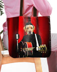 Personalized tote bag with a custom dog portrait in a rock and roll style, playing guitar against a red curtain.